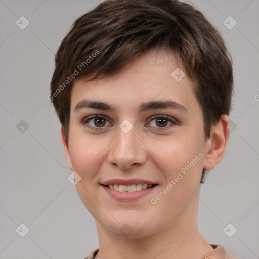 Joyful white young-adult female with short  brown hair and grey eyes