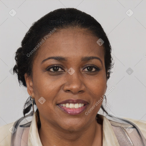 Joyful black young-adult female with long  brown hair and brown eyes