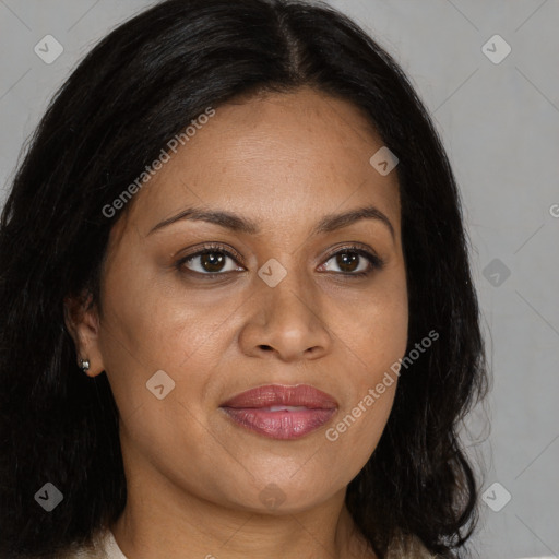 Joyful black adult female with medium  brown hair and brown eyes