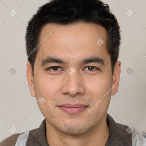 Joyful white adult male with short  brown hair and brown eyes