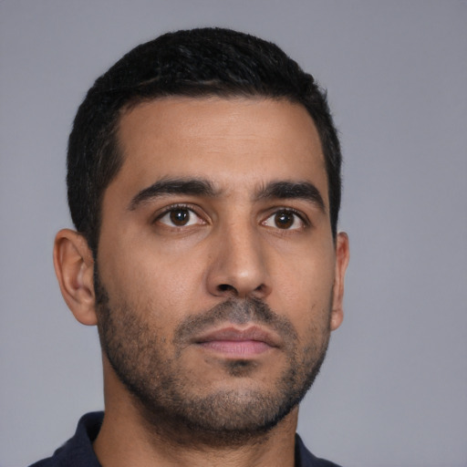 Neutral latino young-adult male with short  black hair and brown eyes