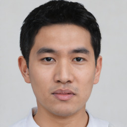 Neutral asian young-adult male with short  black hair and brown eyes