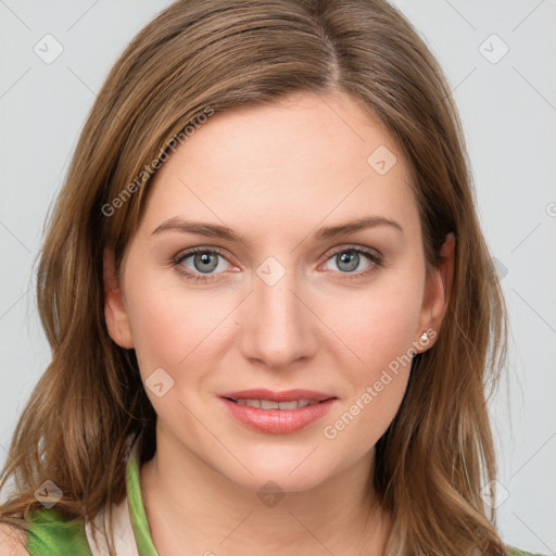 Joyful white young-adult female with long  brown hair and green eyes