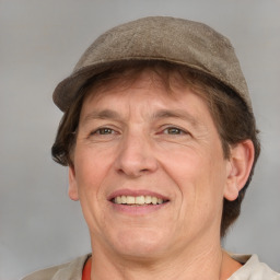 Joyful white adult male with short  brown hair and grey eyes