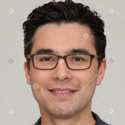 Joyful white young-adult male with short  black hair and brown eyes