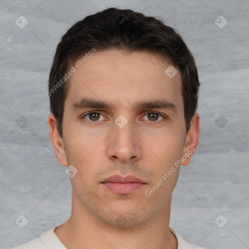 Neutral white young-adult male with short  brown hair and brown eyes