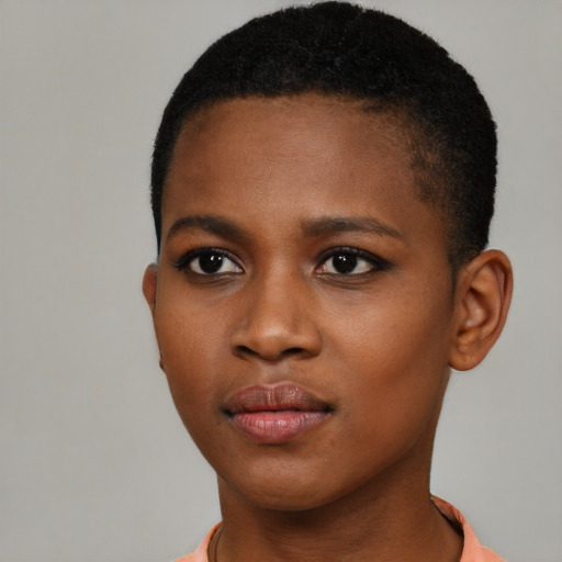 Neutral black young-adult female with short  brown hair and brown eyes