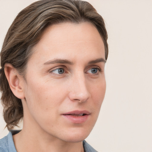 Neutral white young-adult female with medium  brown hair and blue eyes