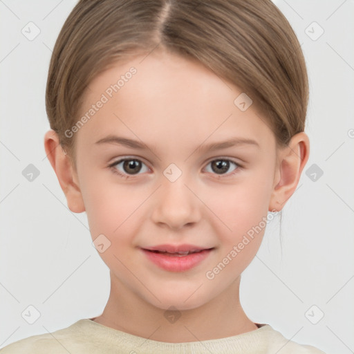 Joyful white child female with short  brown hair and brown eyes