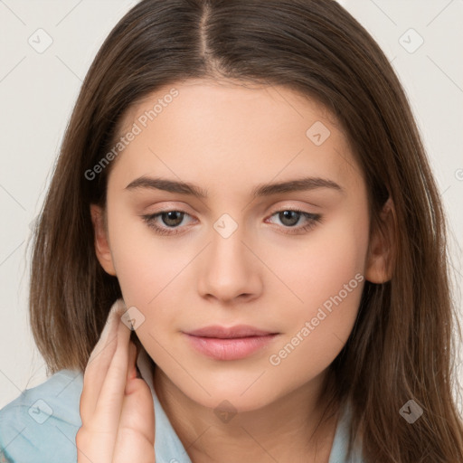 Neutral white young-adult female with long  brown hair and brown eyes