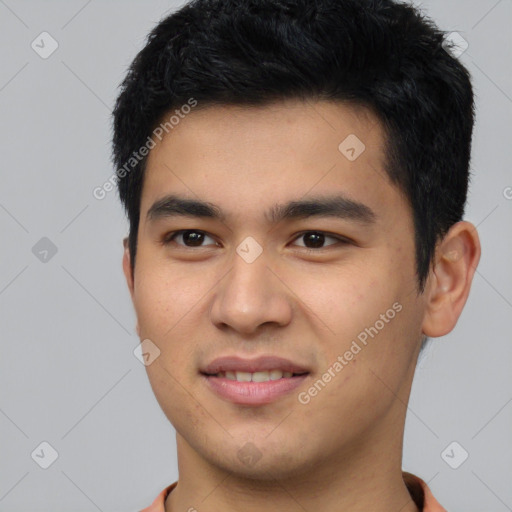 Joyful latino young-adult male with short  black hair and brown eyes