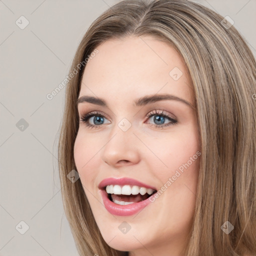 Joyful white young-adult female with long  brown hair and green eyes