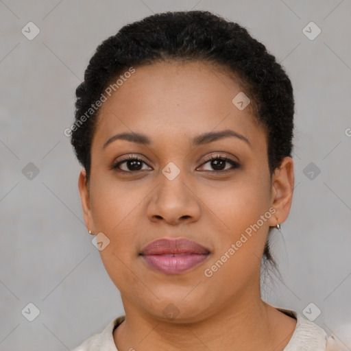 Joyful black young-adult female with short  brown hair and brown eyes