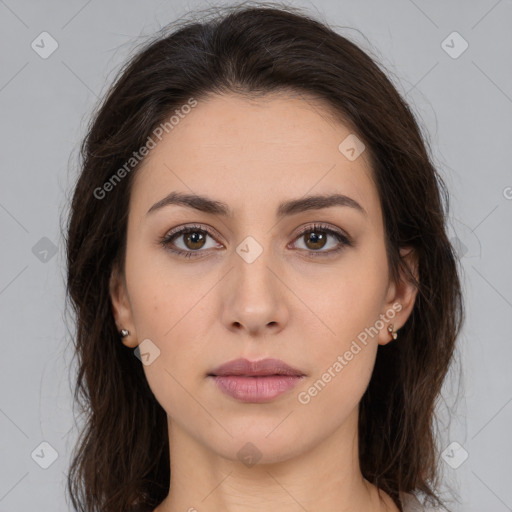 Neutral white young-adult female with long  brown hair and brown eyes