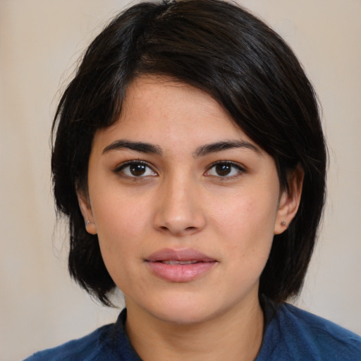 Neutral white young-adult female with medium  black hair and brown eyes