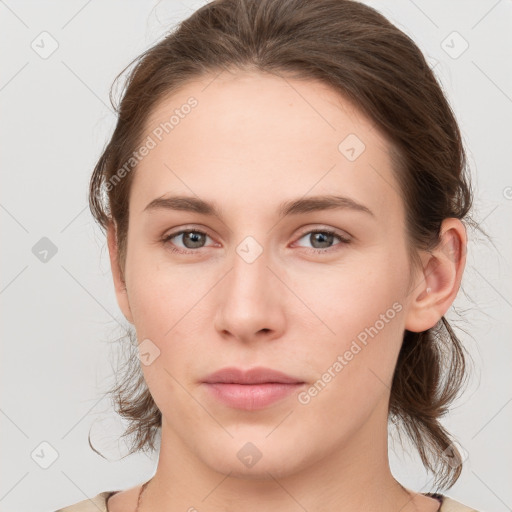 Neutral white young-adult female with medium  brown hair and grey eyes