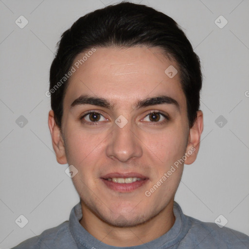 Joyful white young-adult male with short  black hair and brown eyes