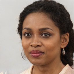 Joyful black young-adult female with medium  brown hair and brown eyes