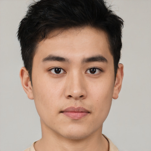 Neutral asian young-adult male with short  brown hair and brown eyes