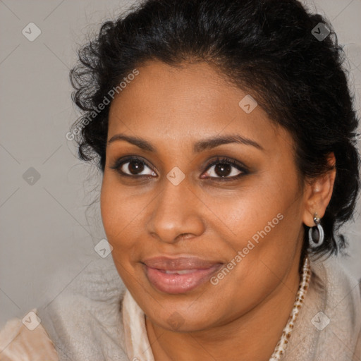 Joyful black young-adult female with long  brown hair and brown eyes