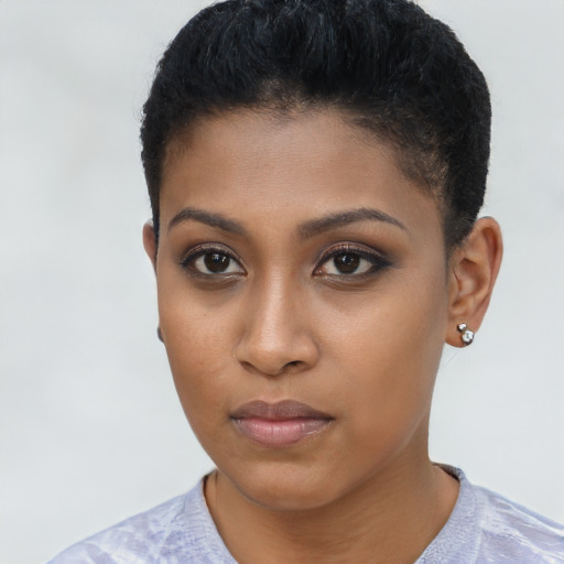 Neutral black young-adult female with short  brown hair and brown eyes