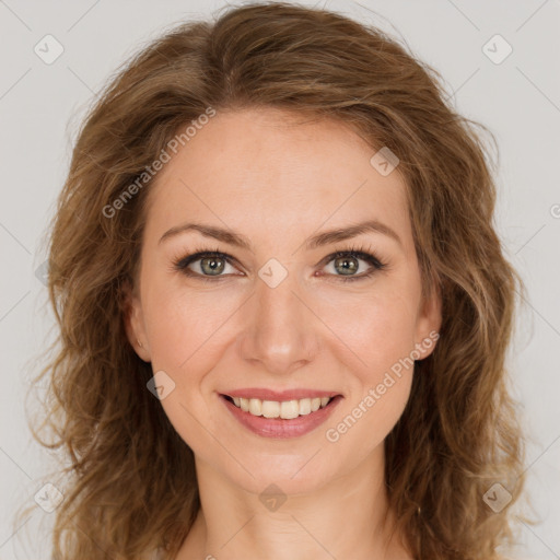 Joyful white young-adult female with long  brown hair and green eyes