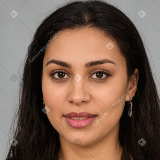 Joyful latino young-adult female with long  brown hair and brown eyes