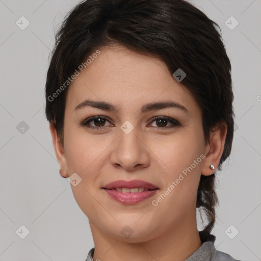 Joyful white young-adult female with medium  brown hair and brown eyes