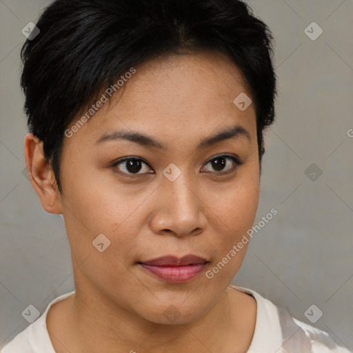 Joyful asian young-adult female with short  brown hair and brown eyes