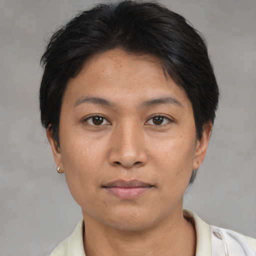 Neutral asian young-adult female with short  brown hair and brown eyes