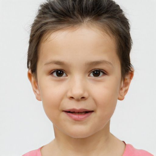 Joyful white child female with short  brown hair and brown eyes