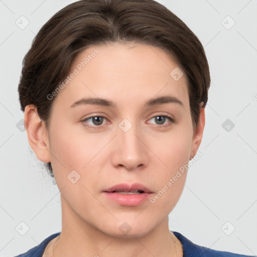 Neutral white young-adult female with short  brown hair and brown eyes