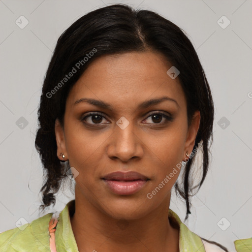 Joyful black young-adult female with medium  brown hair and brown eyes