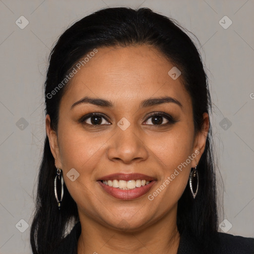 Joyful latino young-adult female with long  brown hair and brown eyes