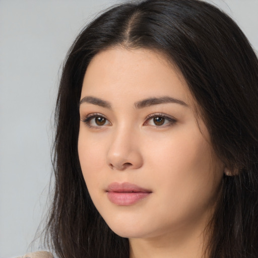 Neutral latino young-adult female with long  brown hair and brown eyes