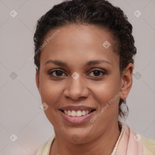 Joyful latino young-adult female with short  brown hair and brown eyes