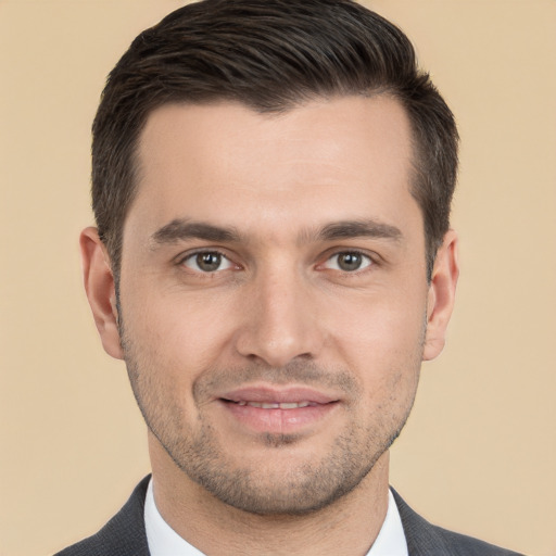 Joyful white young-adult male with short  brown hair and brown eyes