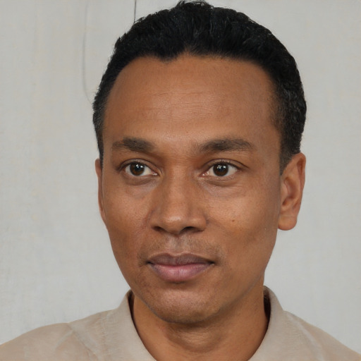 Neutral black adult male with short  black hair and brown eyes