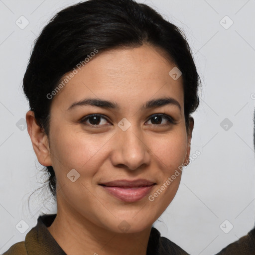 Joyful latino young-adult female with medium  brown hair and brown eyes