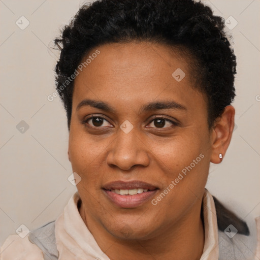 Joyful black adult female with short  brown hair and brown eyes