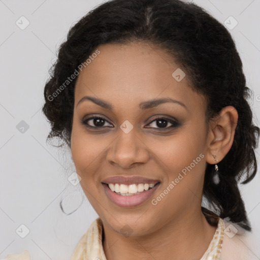 Joyful black young-adult female with long  brown hair and brown eyes