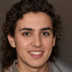 Joyful white young-adult male with medium  brown hair and brown eyes