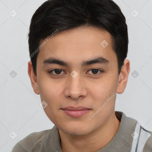 Joyful white young-adult male with short  black hair and brown eyes