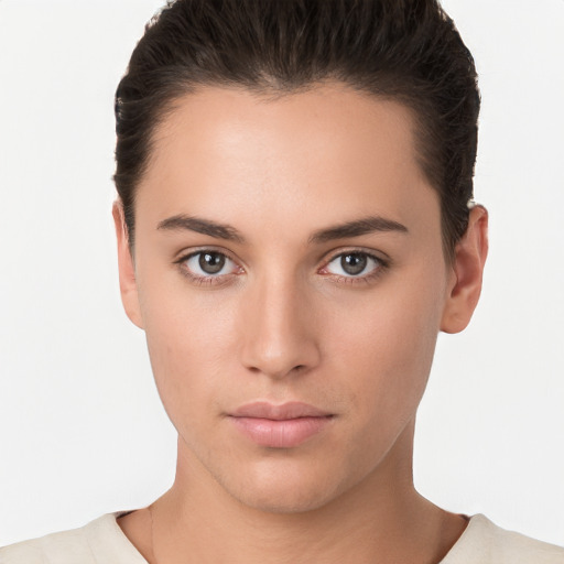 Neutral white young-adult female with short  brown hair and brown eyes