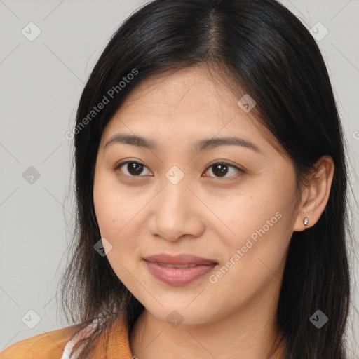 Joyful asian young-adult female with long  brown hair and brown eyes