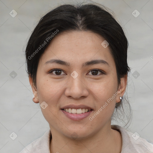 Joyful asian young-adult female with short  brown hair and brown eyes