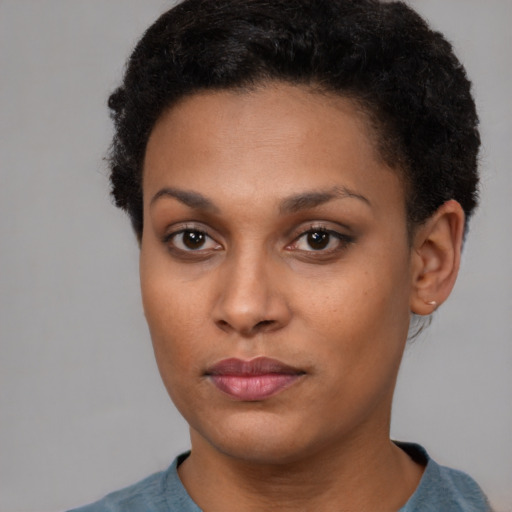 Neutral latino young-adult female with short  brown hair and brown eyes