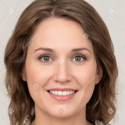 Joyful white young-adult female with medium  brown hair and green eyes