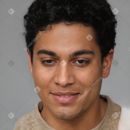 Joyful latino young-adult male with short  brown hair and brown eyes