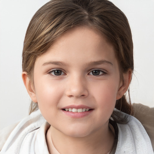 Joyful white child female with short  brown hair and brown eyes